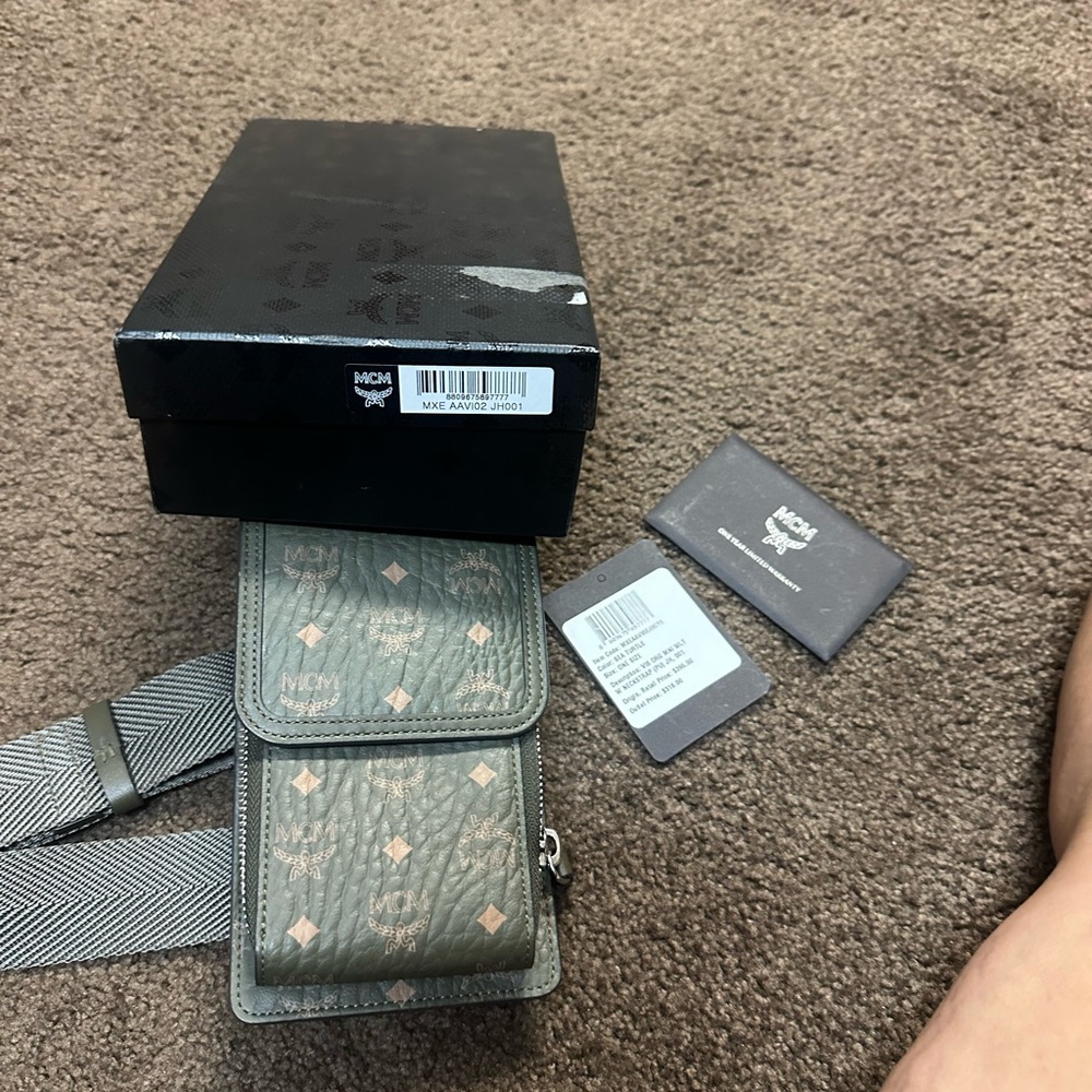MCM org mini Waller with strap. Very cute. Very good shape.